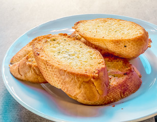 Garlic bread on table