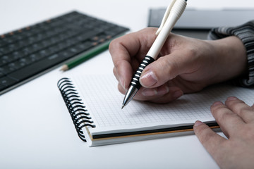 woman is preparing for written work
