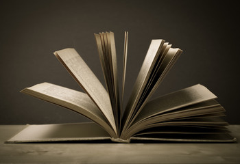 Old books. Selective focus. Shallow depth of field. Toned