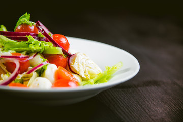 delicious vegetarian salad, salad with fruits and vegetables