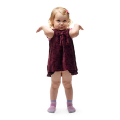Young little girl standing over isolated white background