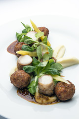 Rabbit and meatballs with mustard sauce