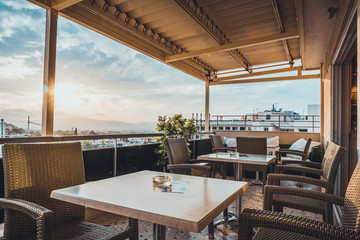 Restaurant tables and chairs on an open air patio