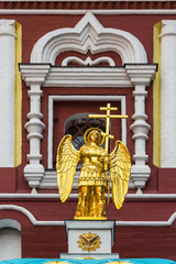 Obraz premium Angel with a cross on a chapel with a list of the Iberian Icon o