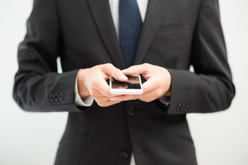 Handsome business asian man using smart phone