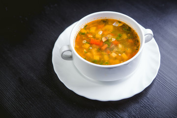 vegetable soup on the plate, delicious dish, food