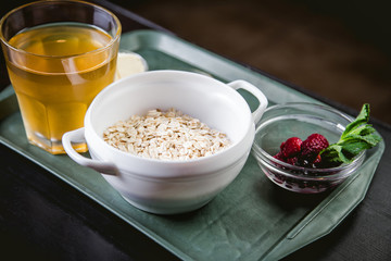 ingredients for oatmeal with berries and honey