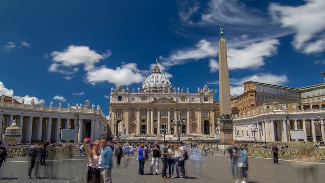 St.Peter's Square full of tourists with St.Peter's Basilica and the Egyptian obelisk within the Vatican City timelapse hyperlapse