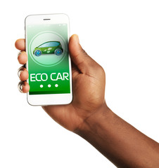 Hand holding mobile smart phone, isolated on white. Eco car concept