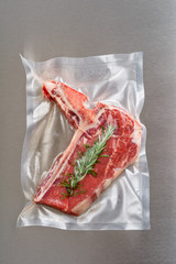 Lamb chop sealed in an airtight plastic bag ready for sous vide cooking
