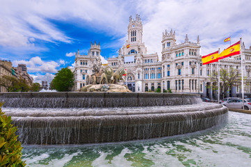 Naklejka premium Cybele's Square (Plaza de la Cibeles) and Central Post Office (Palacio de Comunicaciones) in Madrid, Spain