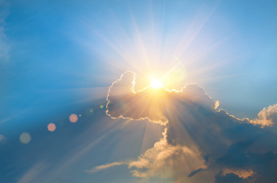 The sun behind the clouds