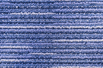 the texture background of the carpet.The blue carpet texture background.