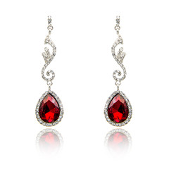 Pair of ruby diamond earrings isolated on white