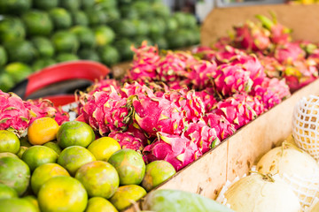 Fruit market with various colorful fresh fruits and vegetables