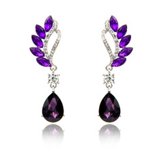 Pair of amethyst diamond earrings isolated on white

