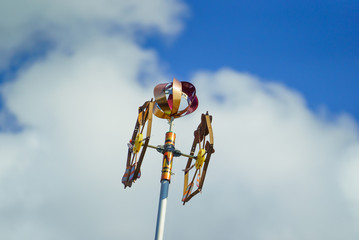 arrow wheel,the decorative windmill attached to the top of the p
