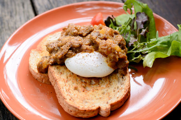 Beef in curry and benedict egg sanwich
