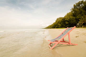 Fototapeta na wymiar Pink beach chair