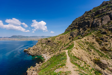 Fototapeta na wymiar Coastal rocks, coastline, rocky shore, view from the sea, the Peninsula of the Crimea, the Black sea coast