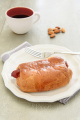 Sausage baked in dough