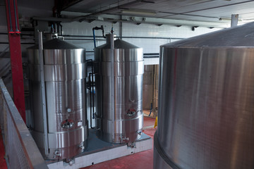 Wine plant shop interior with tanks