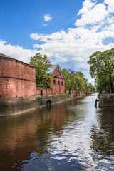 Ancient building of purveyance warehouse of Kronstadt admiralty in Kronstadt on the banks of the...