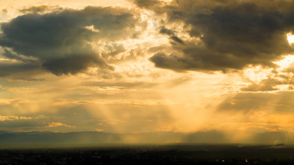 Clouds and Rainy Stormy Night with Sun Rays.
