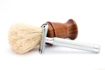 boar shaving brush, and a safety razor on white