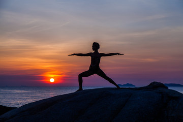 Yoga at sunset time
