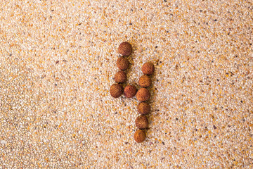 The number four 4 made out of fruit lichee