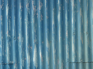 Painted blue corrugated iron as background
