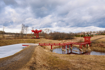 Fototapeta premium Chinese bridge and a gazebo in the Park