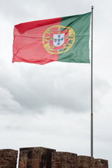 Flag of Portugal on top of a fortress