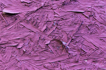 Pink colored recycled compressed hardboard wood chipboard
