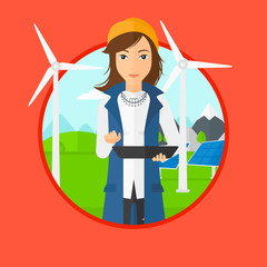 Female worker of solar power plant and wind farm.