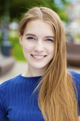 Portrait close up of young beautiful blonde woman