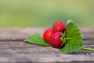 Fresh strawberries on wooden table