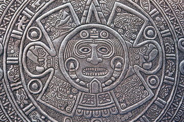 Pagan ornament of a tribe Maya. stone texture