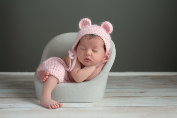 Newborn Girl Wearing a Pink Bear Hat © katrinaelena