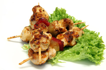 Kebab on salad leaves