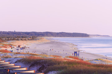 Sundown on beach in Baltic Sea in Ventspils in Latvia