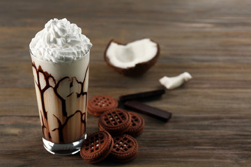 Fresh milk cocktail on wooden background