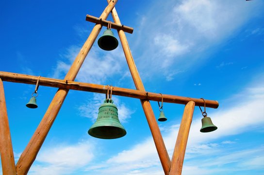 Low angle view of  a wooden construction with bells in front of the house of Pablo Neruda