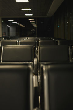 the rows of empty seats in an airport lounge