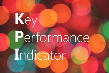 KPI (Key Performance Indicator) acronym on colorful bokeh background