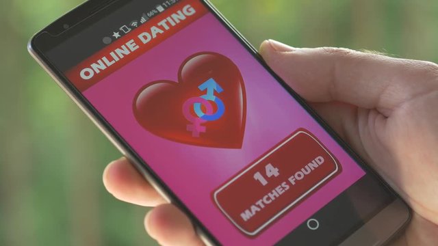 Dating application on a smartphone searching for the perfect match in its data base of members.Online dating has become a very popular way to meet people now and there&rsquo;s no stigma.