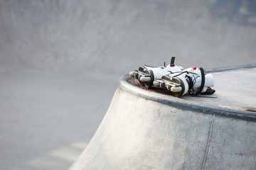 Aggressive inline skates in skate park