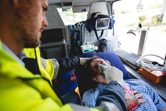 Injured man with ambulance man