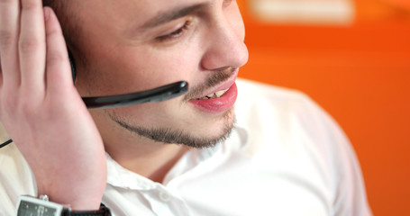 Portrait of confident male customer service representative with
